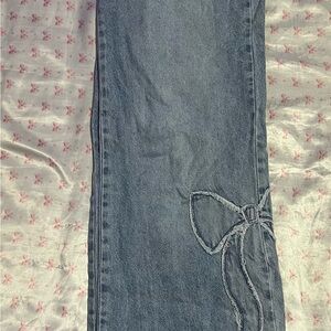 Stylish Blue Jeans with Bow Detail